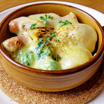 Potato and sausage with raclette cheese