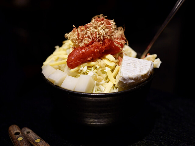 Tsukishima Monja Daruma Solamachi signature dish