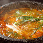 Yakiniku En - 鶏ガラを５時間以上煮込んで特性の辛味噌で味付けした絶品＠＾＾＠　ｖｖｖ６でも　高い評価！