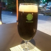 RESTAURANT 1899 OCHANOMIZU - 黒抹茶beer☆グラスのロゴが魅力的。