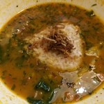 空と大地のトマト麺 Vegie  - 【2015年05月】しそカレー味に「リゾットおむすび」を入れたところ。