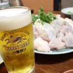 ふぐ政 - 2014年12月　まずは生ビール♪入れ方がお上手。