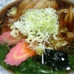 味のむろ市 - ねぎを投入