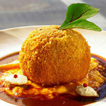 美味卵家 - オレンジ仕立てのリゾットライス。コロッケの中には松のみ、とろけるチーズが入っています