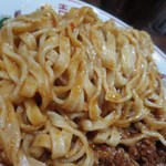 担担麺専門店 DAN DAN NOODLES. ENISHI - 全粒粉入りで平打ちの多加水麺