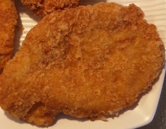 九戸屋肉店 たきざわ日曜朝市店（クノヘヤニクテン） - 大釜（とんかつ）の写真