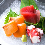 Three pieces of sashimi