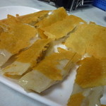 明月湯包 - パリッパリの香ばしい皮と、にんにく香る肉餡の羽つき焼き餃子、招牌鍋貼10個130元