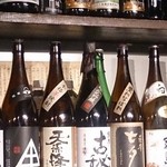 宝 - 棚に並んだ焼酎はまだまだありますよー☆