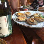 魚山人 - アワビの味噌焼きと店名の焼酎〜(^^)