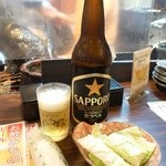 sumibiyakitorikintarou - 大瓶ビール630円(税抜)、お通し100円(税抜)