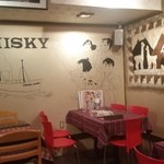 南米ペルー料理 Misky - 店内の様子、大きく壁にMISKYのイラスト