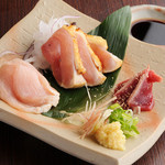 Assortment of three types of chicken sashimi (thigh, breast, and chicken fillet)