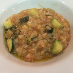 ポエシア - 渡り蟹のトマトクリームリゾットのクリーミーな食感とズッキーニのシャキシャキ感がアクセントに