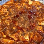 中華料理 唐韻 - 【2015年08月】四川麻婆豆腐の表面、山椒がたっぷりかかってます。