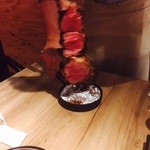 肉酒場 エコヒイキ - 名物のシュラスコ