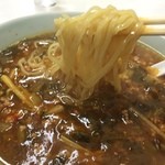 香喜 - 「つけものそば」は、野沢菜漬け物を細かく刻んで挽肉と筍と炒めたピリ辛あんかけそばでした。