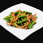 Garlic sprouts and shredded pork stir-fried with soy sauce