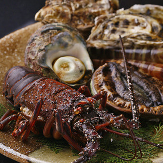 Fresh seafood cooked live from the Teppan-yaki tank right in front of you.