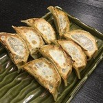 牛もつ鍋 川端 - 餃子は薄い皮がモチモチ