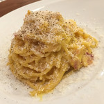 トラットリア ポルコロッソ - 濃〜い卵で作った特製カルボナーラ♪