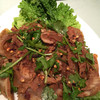 金芦笙小镇精品特色酒店 - 料理写真:凉拌肺片。香菜好きにはたまりません。