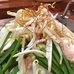 杵屋 - もつ焼きうどん。
            この店の鉄板メニュー。