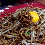 バソキ屋 - 辛胡麻と卵黄のトッピング