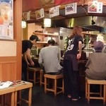 海鮮居酒屋 がいや - 店入口からカウンター