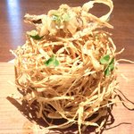 ル スプートニク - ランチコース 7128円 の鳥の巣状の牛蒡のフリット 稚鮎のフリットのせ