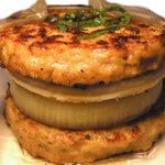 食事処 まるやま - 料理写真:肉ではさんだ逆バーガーです。ソースは地元の由仁商業高校が開発した愛郷ドレッシングを使っています。