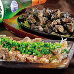 地鶏処 本丸 - 　地鶏のもも焼き