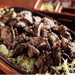 地鶏処 本丸 - 　地鶏のもも焼き