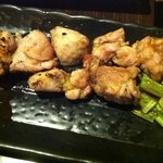 炉端処 一心 - 地鶏のもも焼き