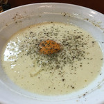 とんこつらーめん ひかり - 2015年10月13日
      チーズインパクトの〆のチーズリゾット