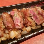 漁村料理 夢市場 - 鹿児島県産　黒毛和牛上カルビ　バター醤油焼き