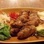 クリヤム - サイクロークイサーン（自家製タイ東北地方のソーセージ（600円））は、粗挽きの豚肉にハーブ類を練り込んだ腸詰めソーセージだった。