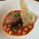 カーサ・デル・チーボ - カリッと仕上げた松阪豚バラ肉とンドゥイヤのトマト煮込み