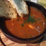 クワトロチンクエ - 牡蠣のプッタネスカ煮込み