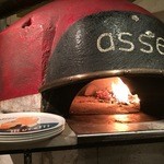 Pizzeria  ａｓｓｅ - テントウムシ柄の薪窯です