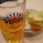 Yokota Sakaba - 生ビールにお通しはキャベツ！