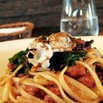 パスタ フレスカ ダンメン - 地ダコと由良産ワカメ、淡路トマトソースの七味風味　リングイネで。¥1.050