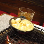 炭火焼しちりん - 名物のニンニクのオイル焼き