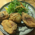 寅寅寅 - 骨付モモ肉の唐揚げ(カリッカリッでオススメ)