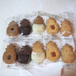 Honolulu Cookie Company - バター・マカデミア、パイナップル・マカデミア、ホワイト・チョコレートディップ・マカデミア、ホワイト・チョコレート・ココナッツ、ダーク・トリプル・チョコレート・マカデミア、コナ・コーヒー
            