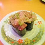 Sushi Ichiba - ハマチと茎ワサビの軍艦。100円
