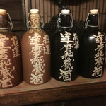 Daruma - 壁の棚にあるお酒あっぷ！その名も「達磨秘蔵の酒」^^