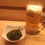 大衆酒場 YATSU the CAFE 金沢文庫店 - お通し(新わかめの土佐酢かけ)/MOLT'StheDRAFT