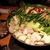 鍋奉行 - 料理写真:博多もつ鍋と海鮮カルパッチョ