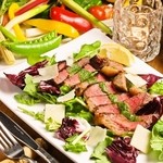 Bistro &K - 牛もも肉のタリアータサルサヴェルデサース